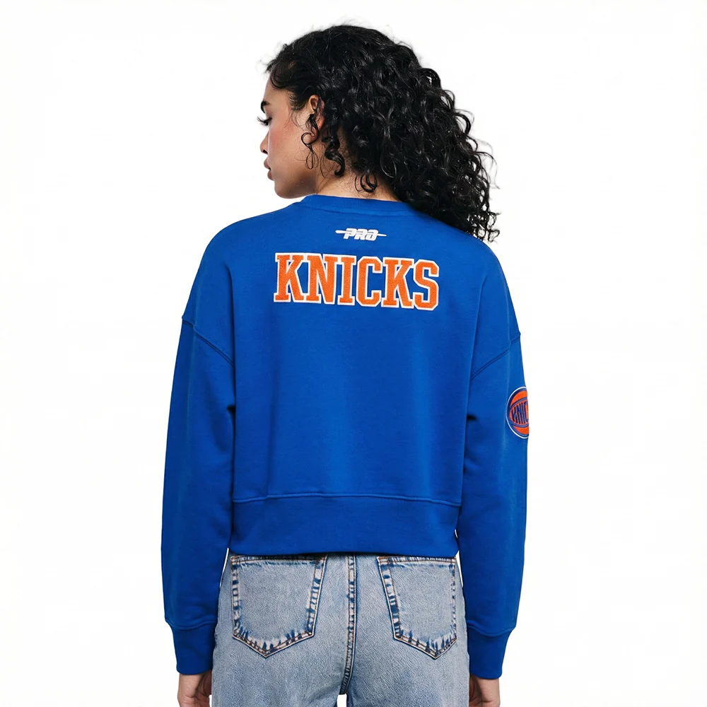 NBA NEW YORK KNICKS MIKAL BRIDGES #25 CLASSIC PLAYER NAME AND NUMBER WOMEN'S FLC CREWNECK - Image 2