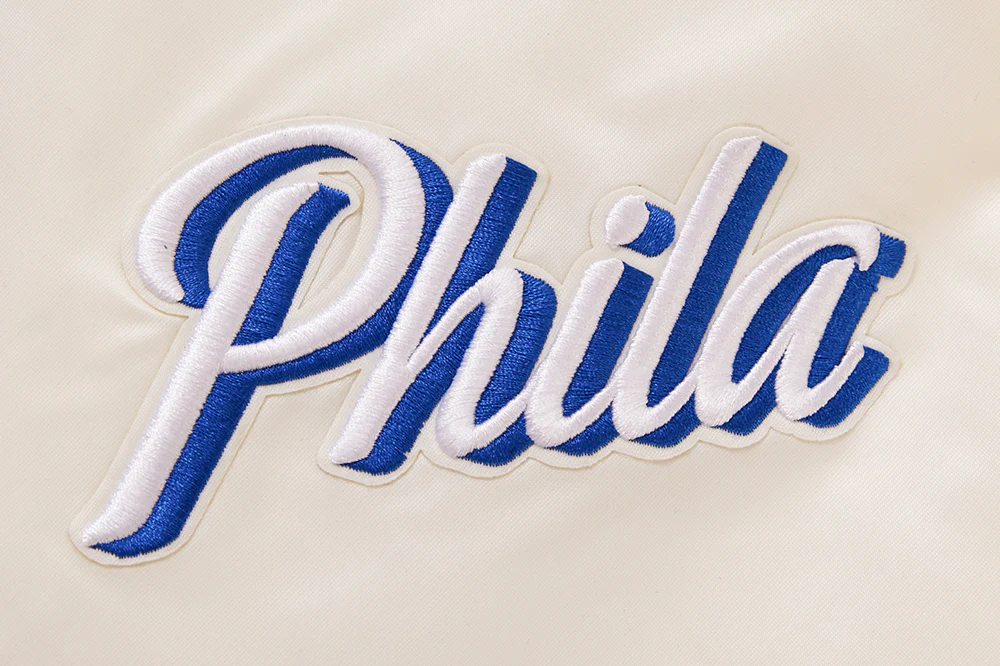 NBA PHILADELPHIA 76ERS RETRO CLASSIC MEN'S RIB SATIN JACKET (EGGSHELL/ ROYAL BLUE) - Image 7